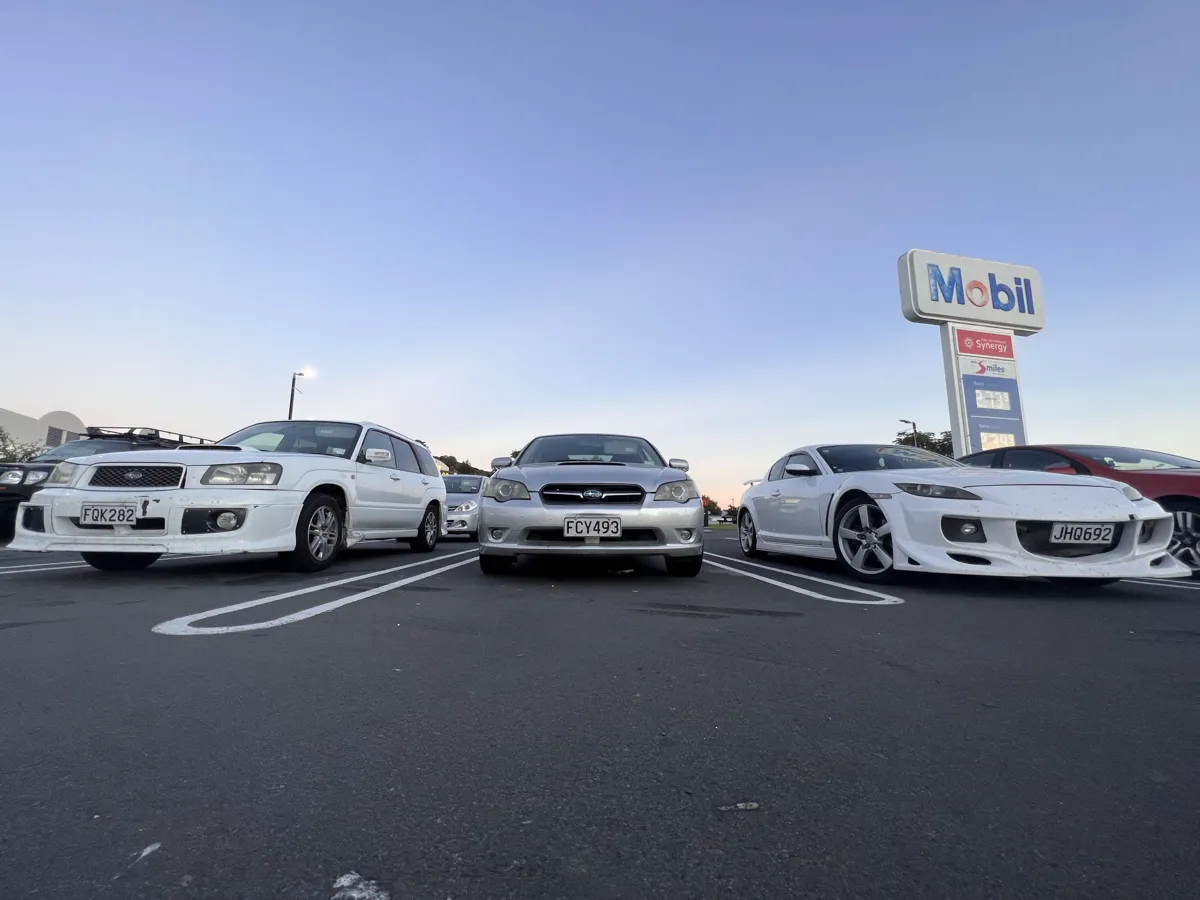 Cars lined up during a road trip stop